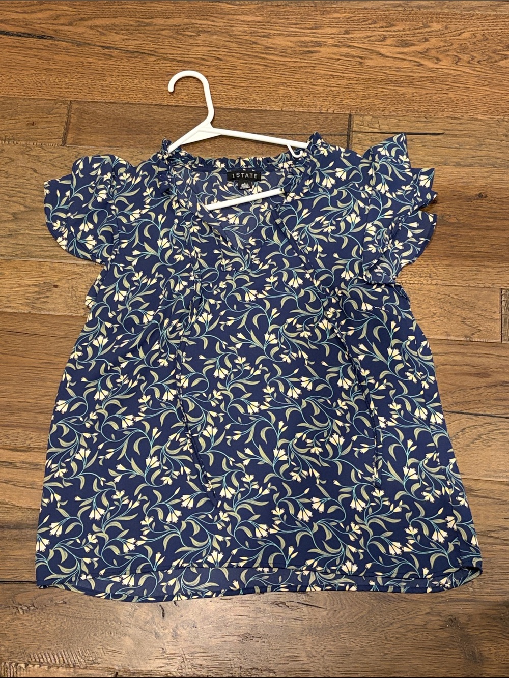 1. State Navy Floral Tie-Neck Ruffle Sleeve Blouse